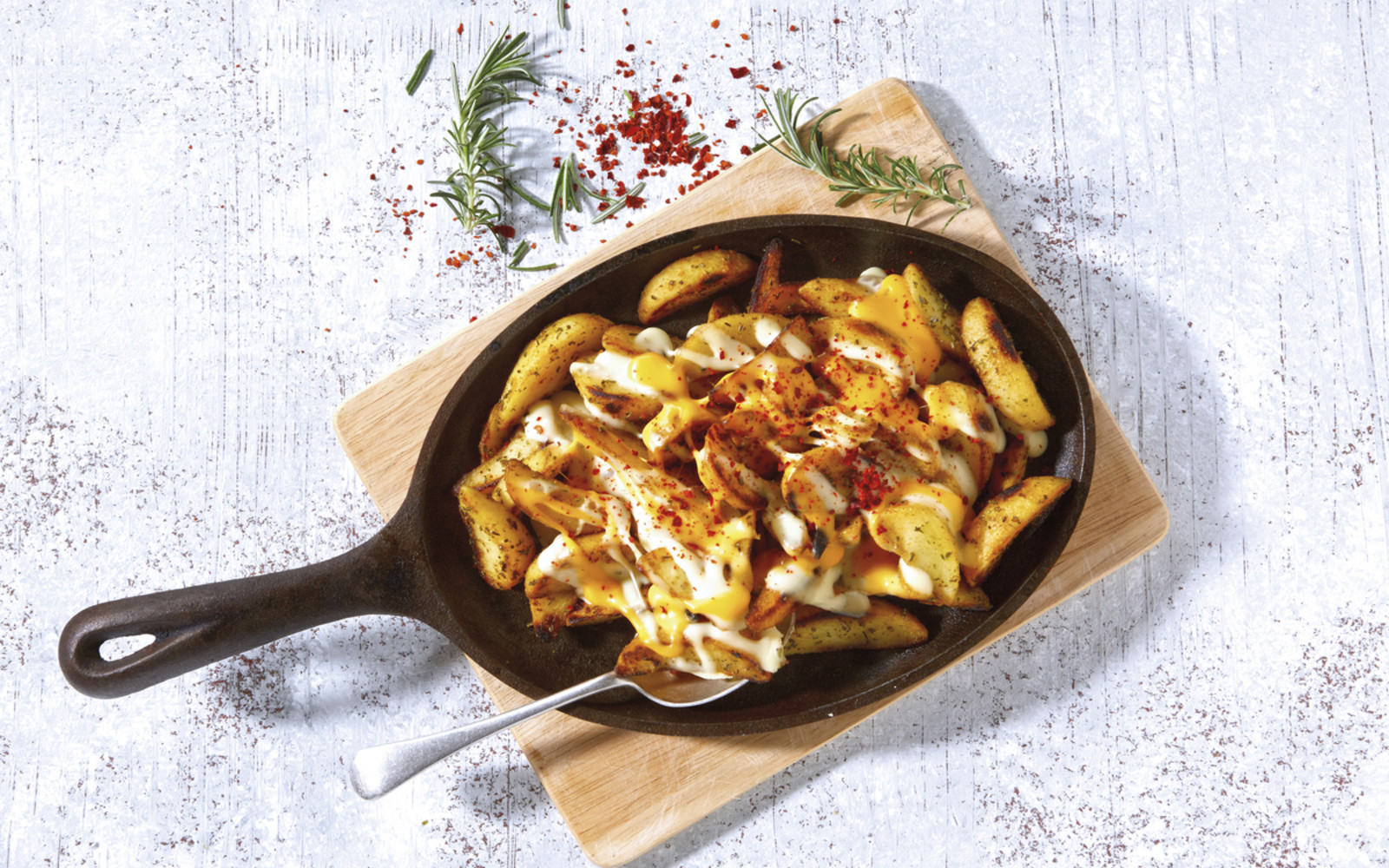 Grill-Wedges mit Käse-Mash